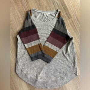 Gray sweater with color block sleeves